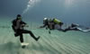 diving instructor with diver in green bay cyprus